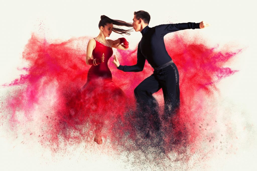 Pair of dancers dancing ballroom. Color dust effect background - intro to Awesome YouTube Dance Mashup Videos
