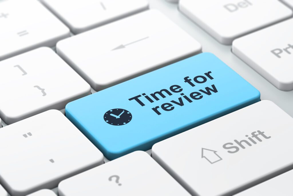 Timeline concept: computer keyboard with Clock icon and word Time for Review, selected focus on enter button, 3d render